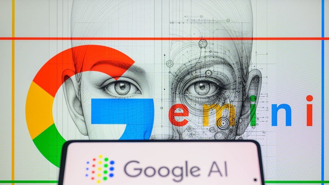 The Google AI logo is being displayed on a smartphone with Gemini in the background.