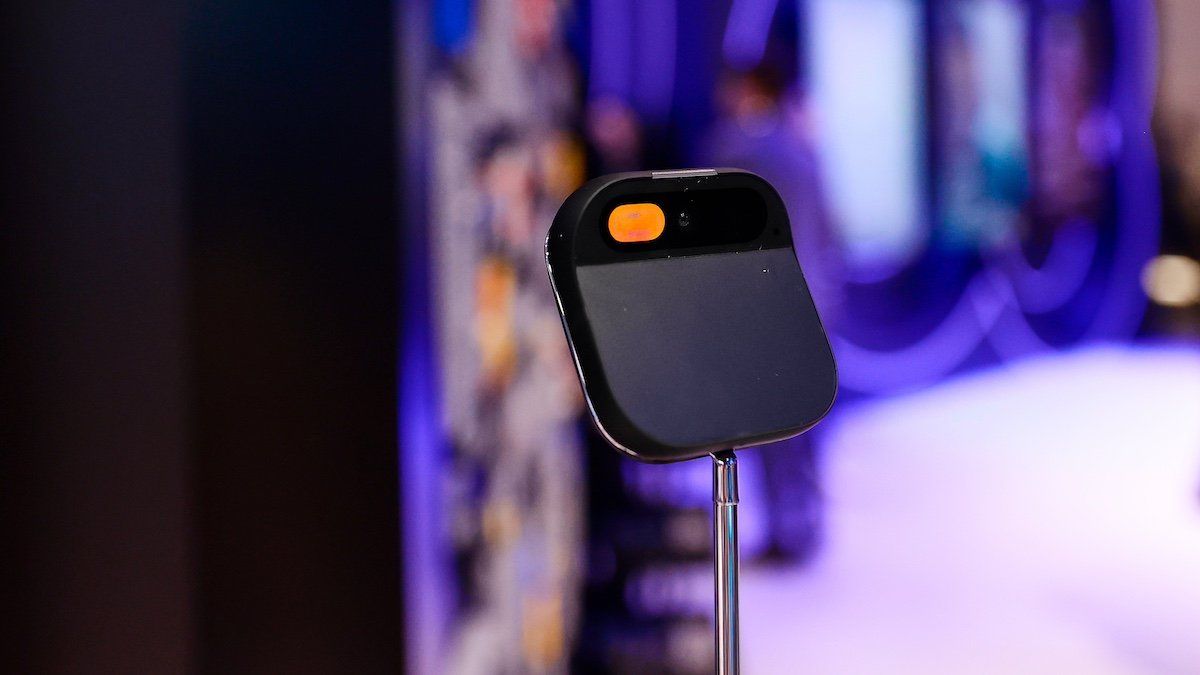​The Humane AI Pin, an innovative wearable device that features a camera and a projector and can be worn as a chest pin or an accessory, is being exhibited at the SK Telecom pavilion during the Mobile World Congress 2024 in Barcelona, Spain, on April 2, 2024. 