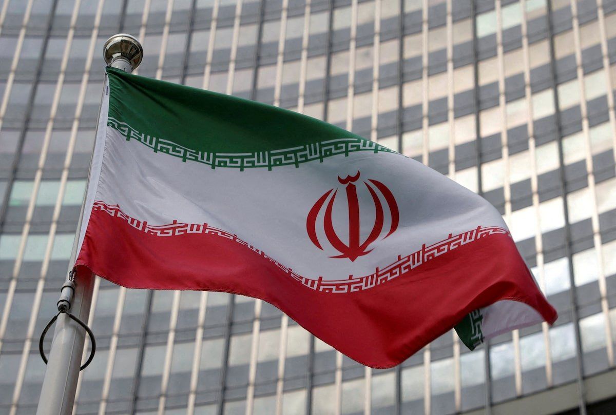The Iranian flag flutters in front of the International Atomic Energy Agency (IAEA) organisation's headquarters in Vienna, Austria, June 5, 2023. 