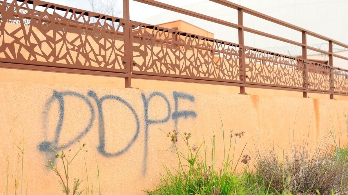 ​The letters "DDPF" are seen tagged on a wall of the Aix-Luynes Penitentiary Center in Aix-en-Provence, France, on April 15, 2025.