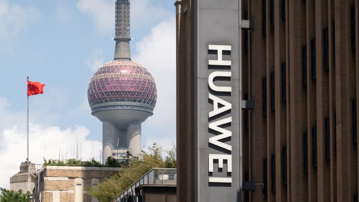 The logo of Huawei's global flagship store is displayed in the Huangpu district of Shanghai, China.