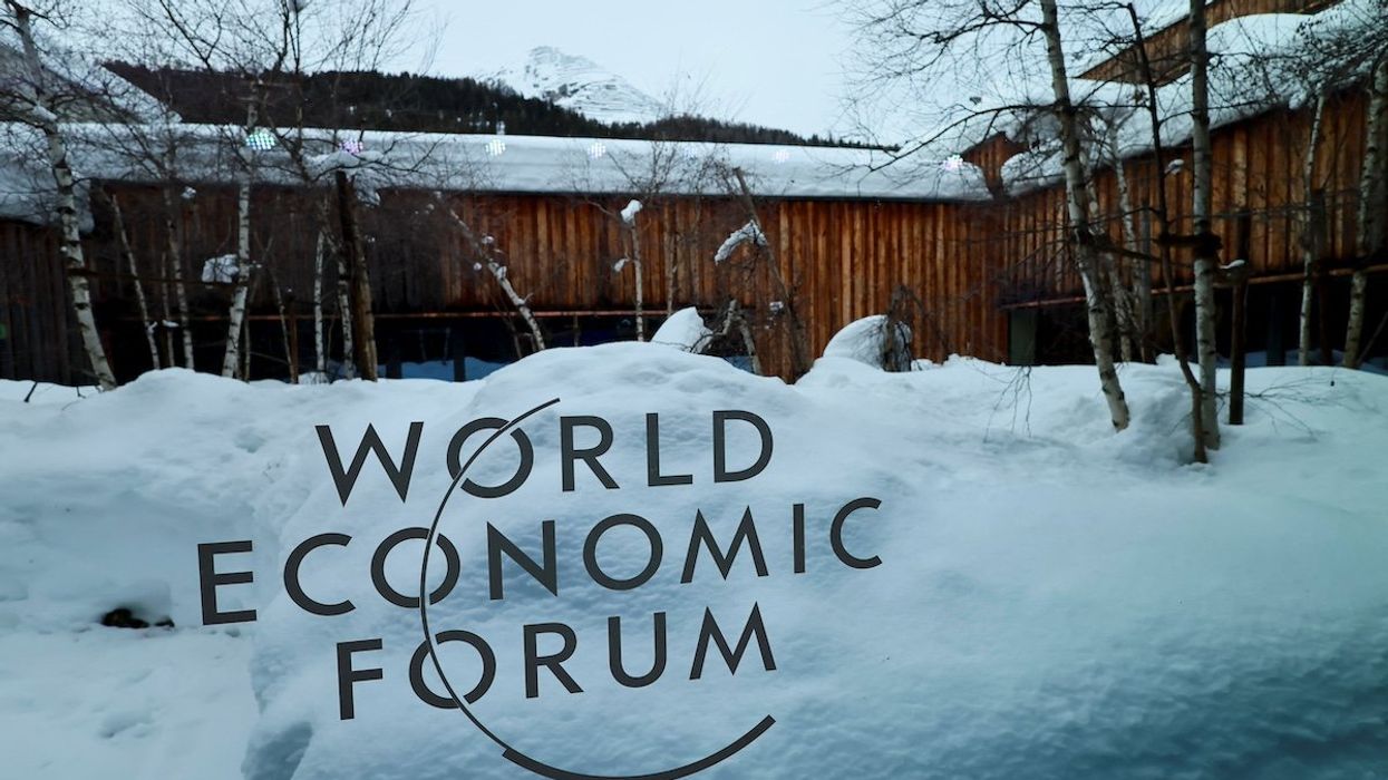 The logo of the World Economic Forum (WEF) is displayed on a window, during the 54th annual meeting of the WEF, in Davos, Switzerland, January 18, 2024.