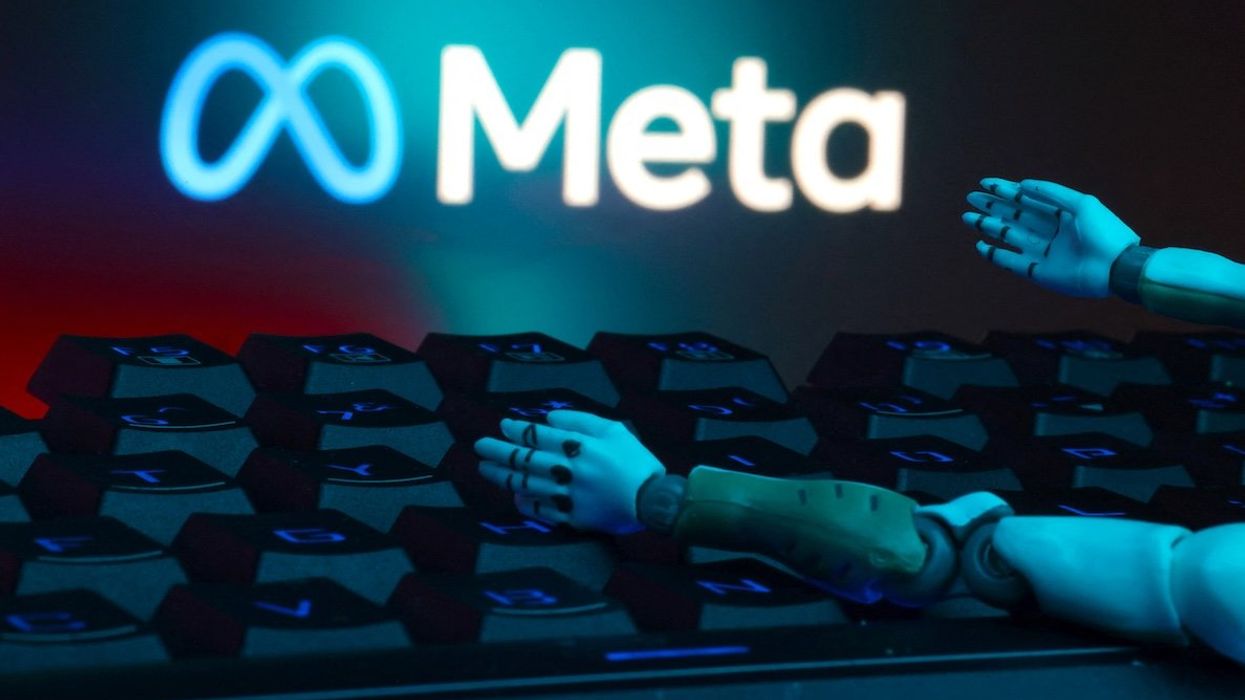 The Meta logo, a keyboard, and robot hands are seen in this illustration taken on Jan. 27, 2025. 