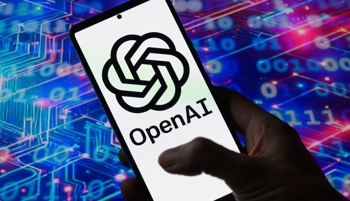 The OpenAi logo is displayed on a mobile screen in this photo illustration.