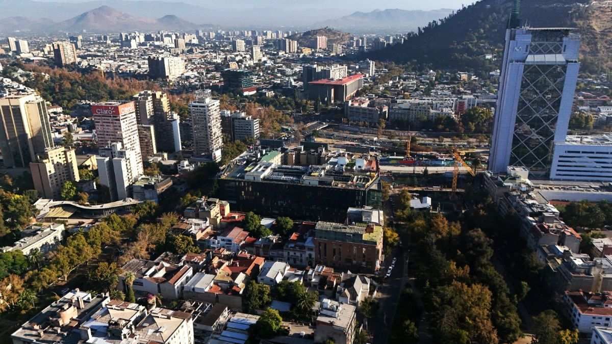 The photos show an aerial view of Santiago de Chile on April 8, 2025. 