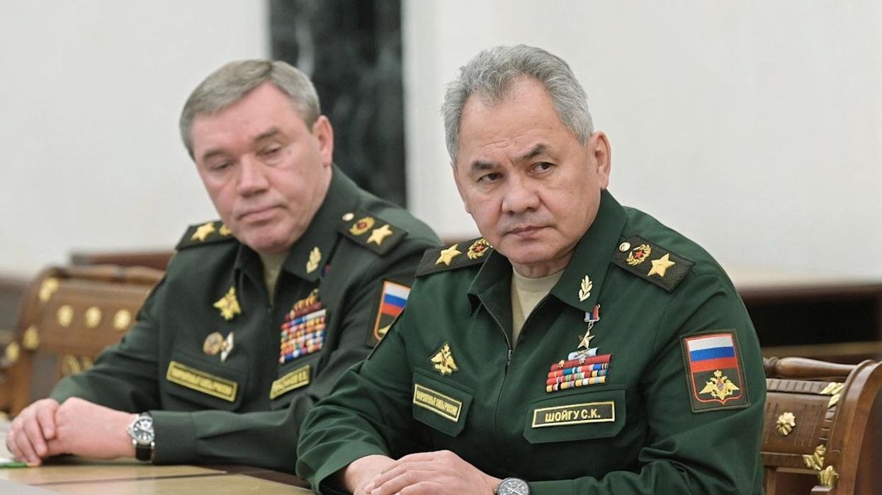 The powerful Russian defence minister Sergei Shoigu (R) and General Valery Gerasimov, the chief of the general staff of Russia armed forces