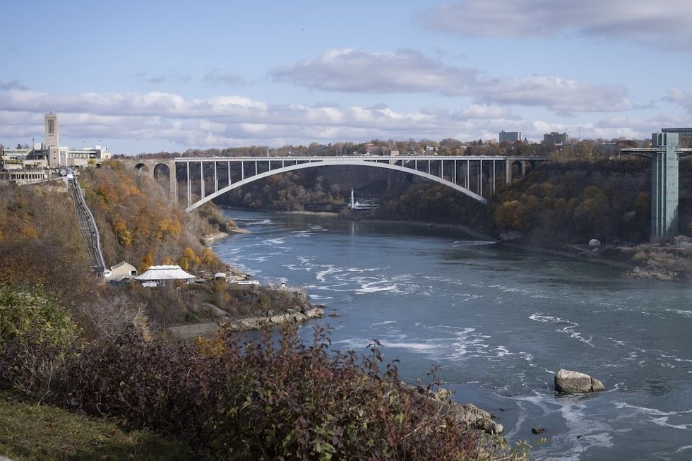 The Rainbow Bridge over the Niagara River links the borders of Niagara Falls in Ontario, Canada, to Niagara Falls in New York. 