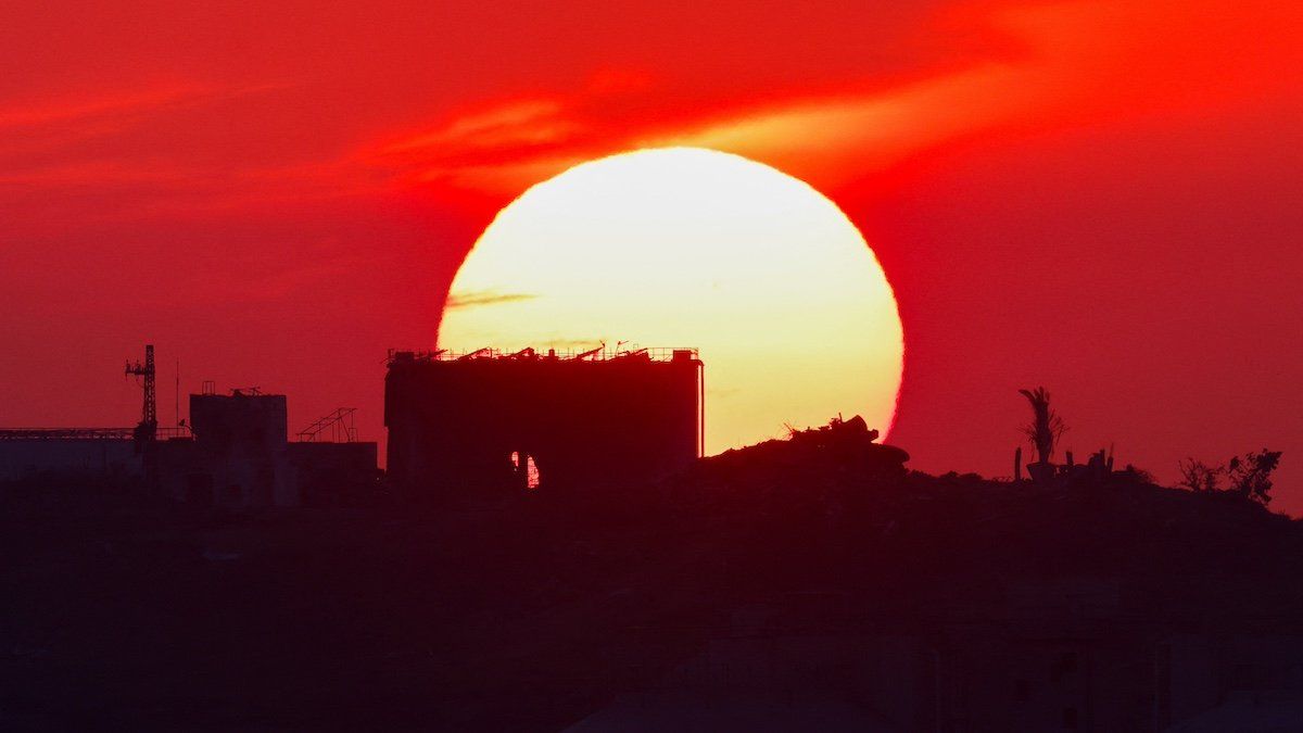 ​The sun sets over Gaza, amid the ongoing conflict between Israel and the Palestinian Islamist group Hamas, as seen from the border with Gaza in southern Israel April 7, 2024. 