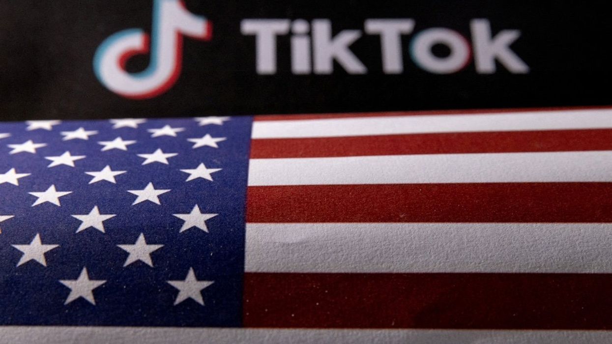 The US flag and TikTok logo are seen in this illustration taken June 2, 2023.