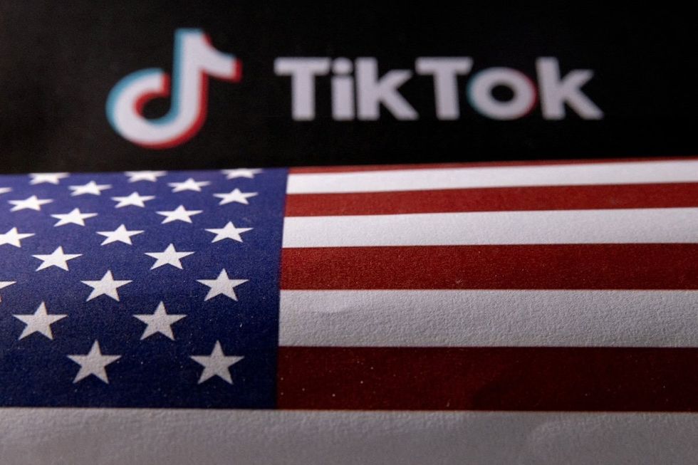 ​​The US flag and TikTok logo are seen in this illustration taken June 2, 2023. 