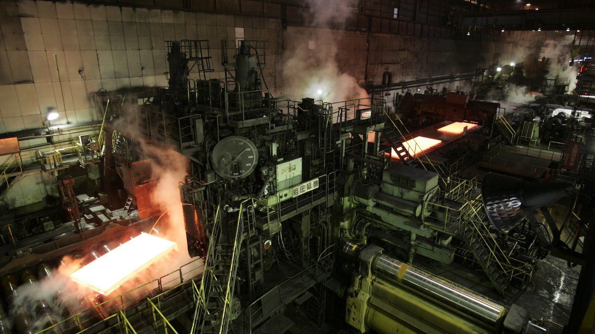 Thick plates of steel for use in construction and ship building are hot-rolled by machinery at the Nippon Steel Corp. Kimitsu steel mill in Kimitsu, Japan near Tokyo February 6, 2008.
