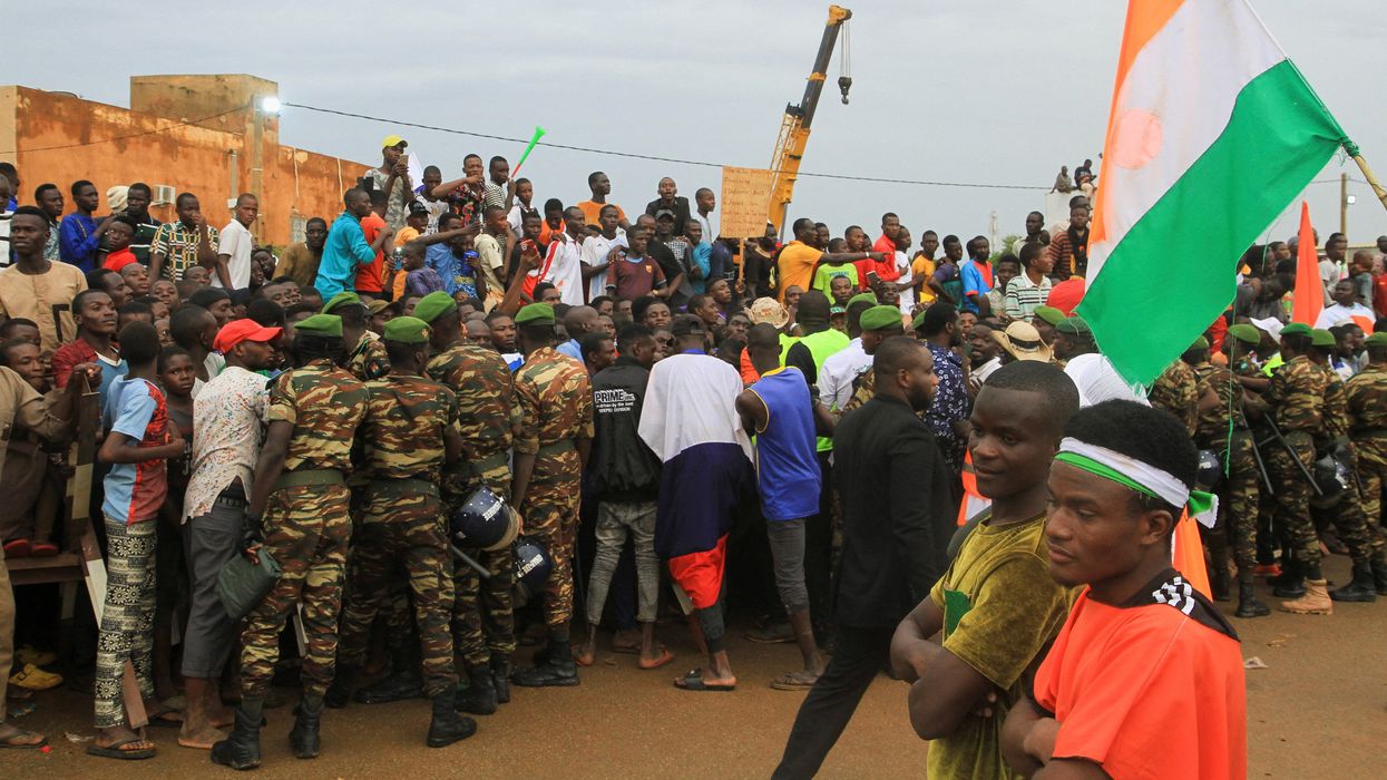 Thousands of Nigeriens gather in front of the French army headquarter, in support of the putschist soldiers and to demand the French army to leave, in Niamey, Niger.