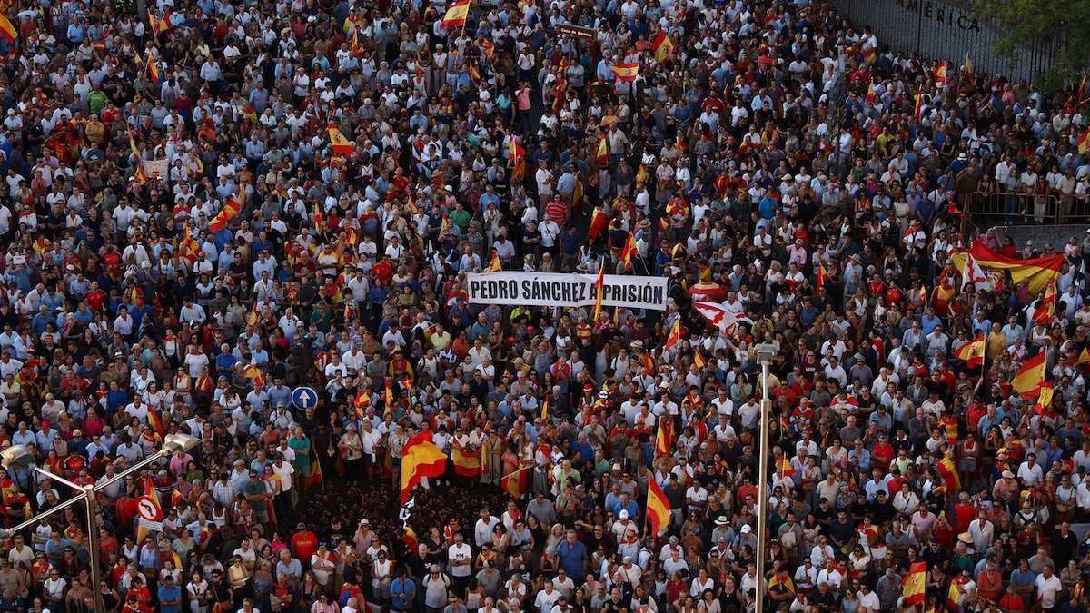 Thousands of people gather at the Palacio de Cibeles, seat of the Madrid City Council, in Madrid, Spain during demonstrations held outside city halls in autonomous communities across Spain in protest of the mass entry of migrants at the Ceuta border.