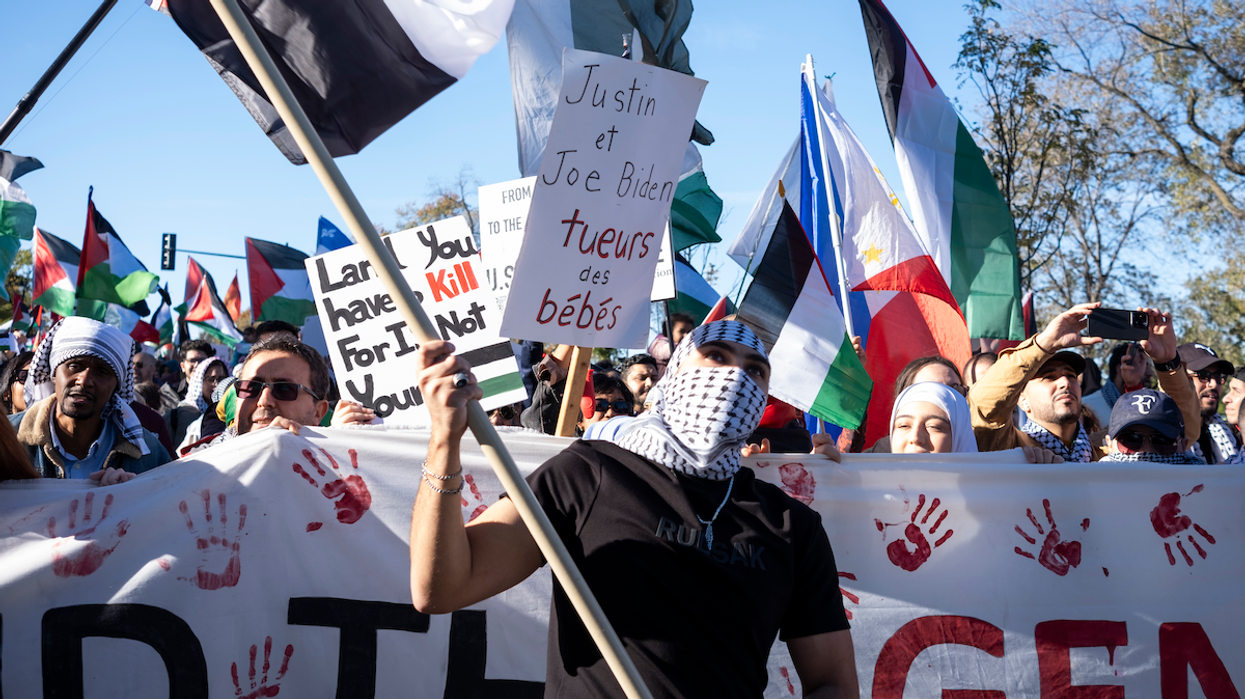 Thousands protest Israel's war against Hamas in front of the monument to Sir George-Etienne Cartier in Montreal, carrying placards calling out Joe Biden and Justin Trudeau for their support of Israel.