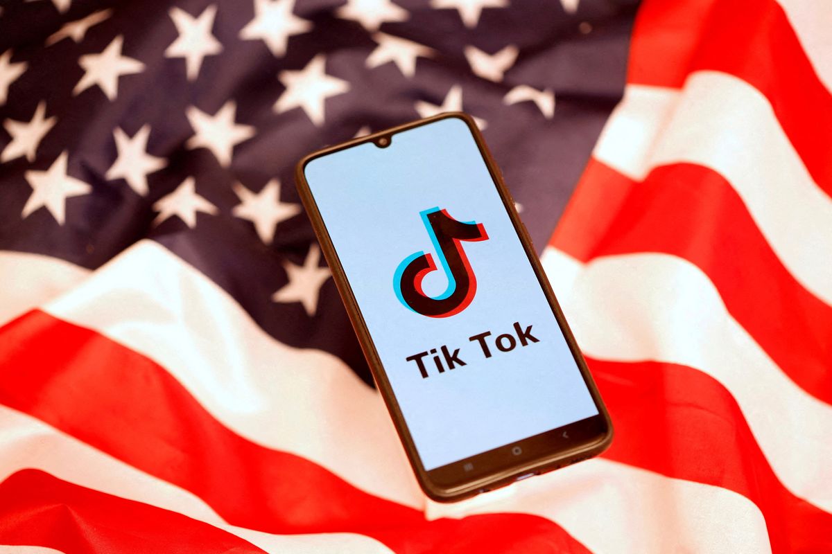 TikTok app in front of an American flag