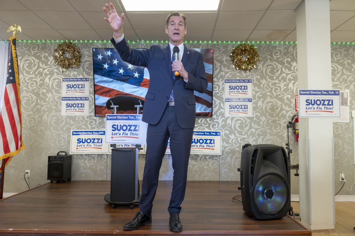 Tom Suozzi speaks at an election rally in Floral Park.