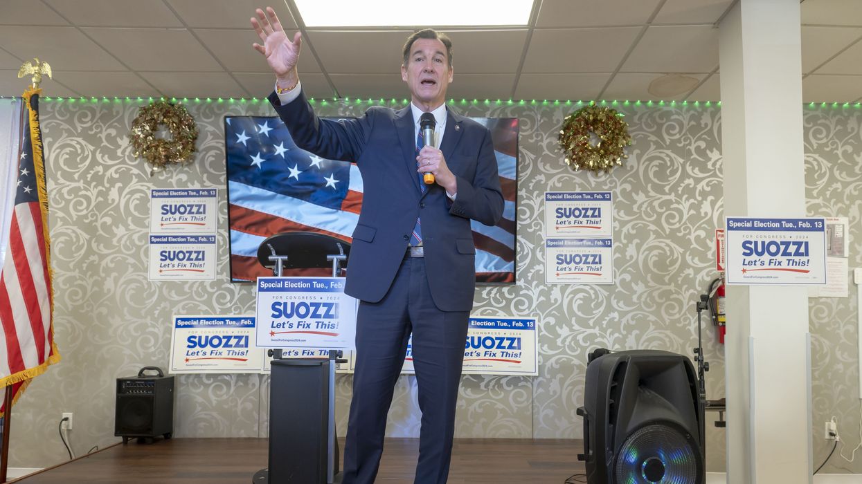 Tom Suozzi speaks at an election rally in Floral Park.