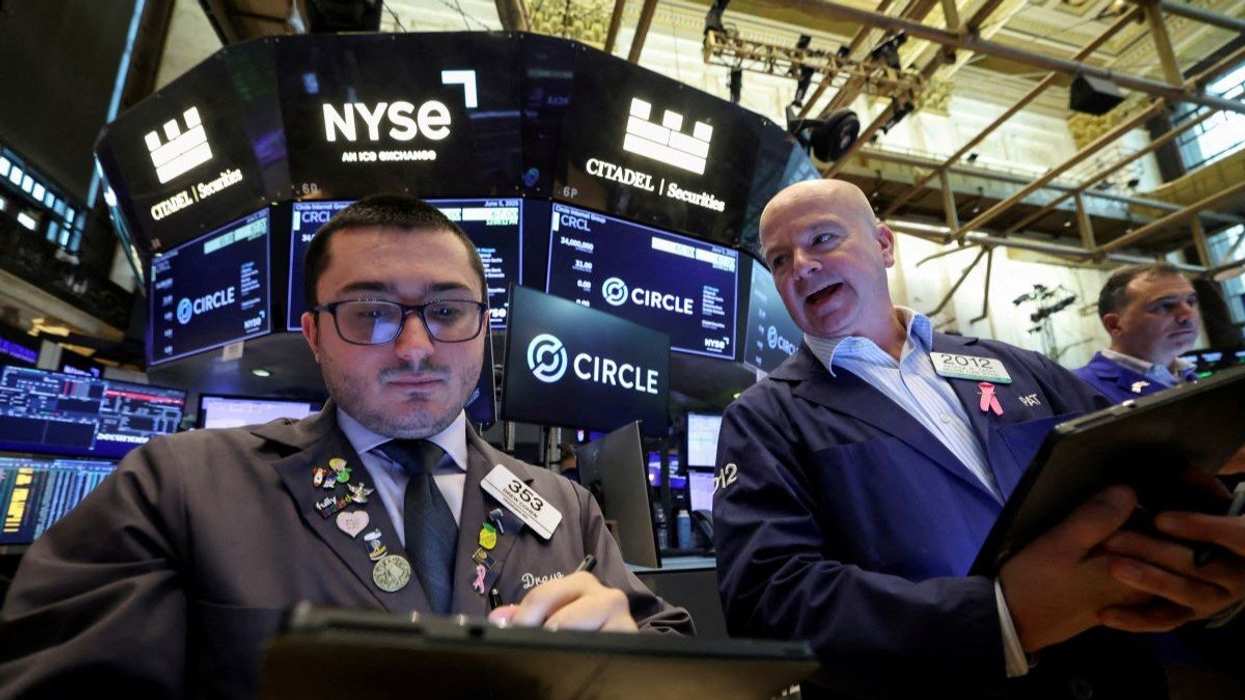 Traders work on the floor at the New York Stock Exchange (NYSE), on the day of Circle Internet Group's IPO, in New York City, U.S., June 5, 2025.