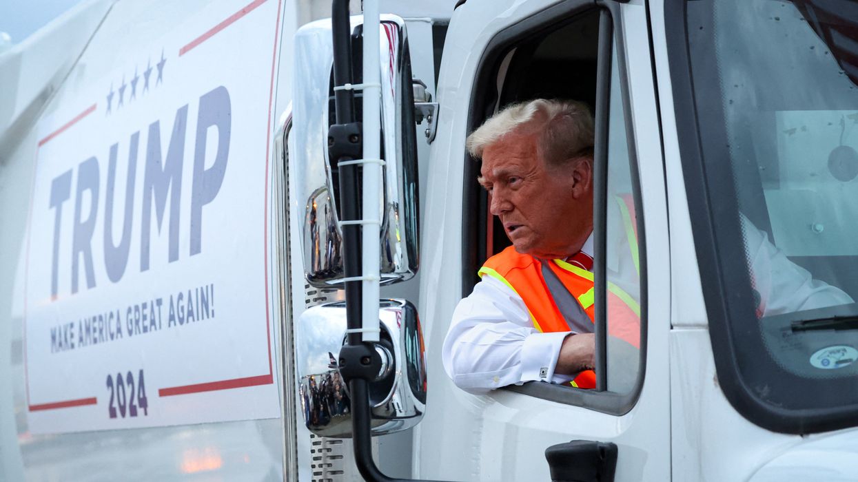 Trump in a garbage truck.