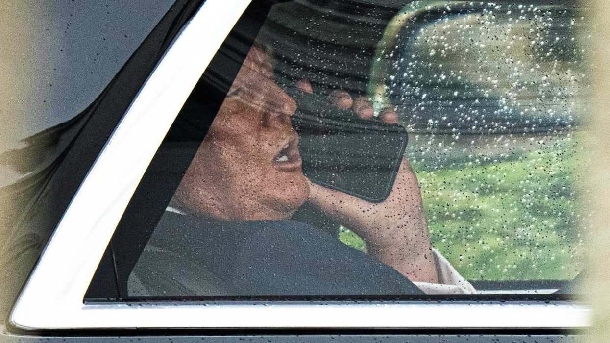 Trump speaking on the phone in his car