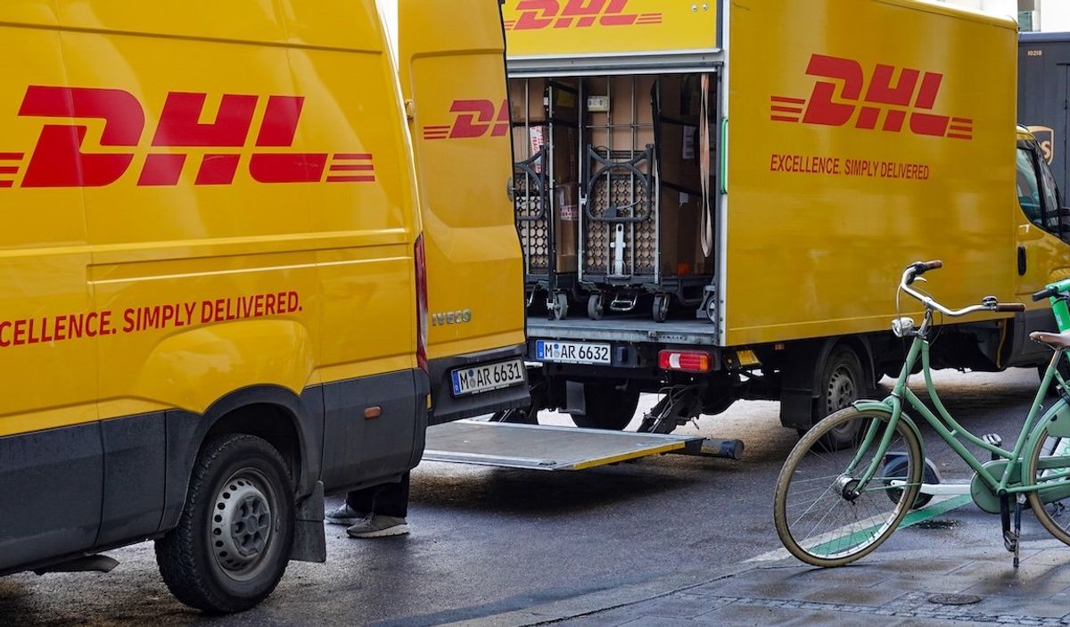 ​Two DHL delivery vans