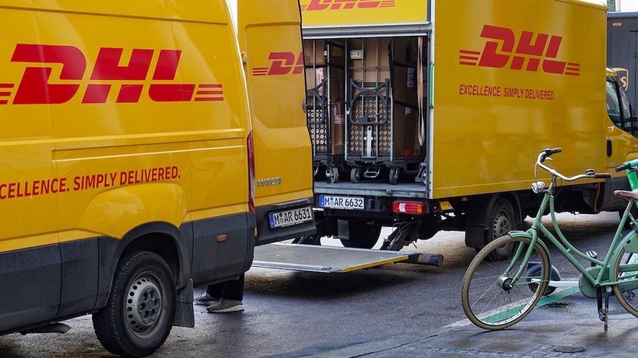 Two DHL delivery vans