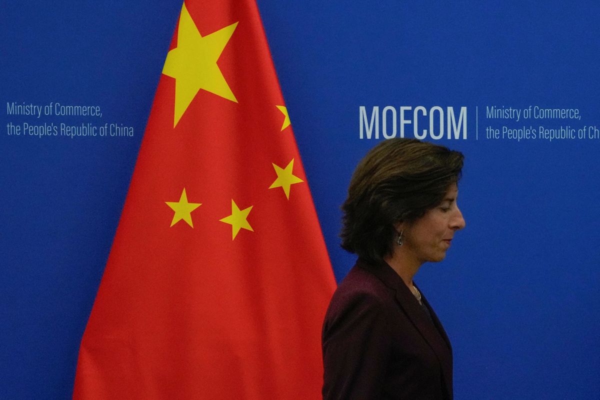 U.S. Commerce Secretary Gina Raimondo arrives for a meeting with her Chinese counterpart Wang Wentao