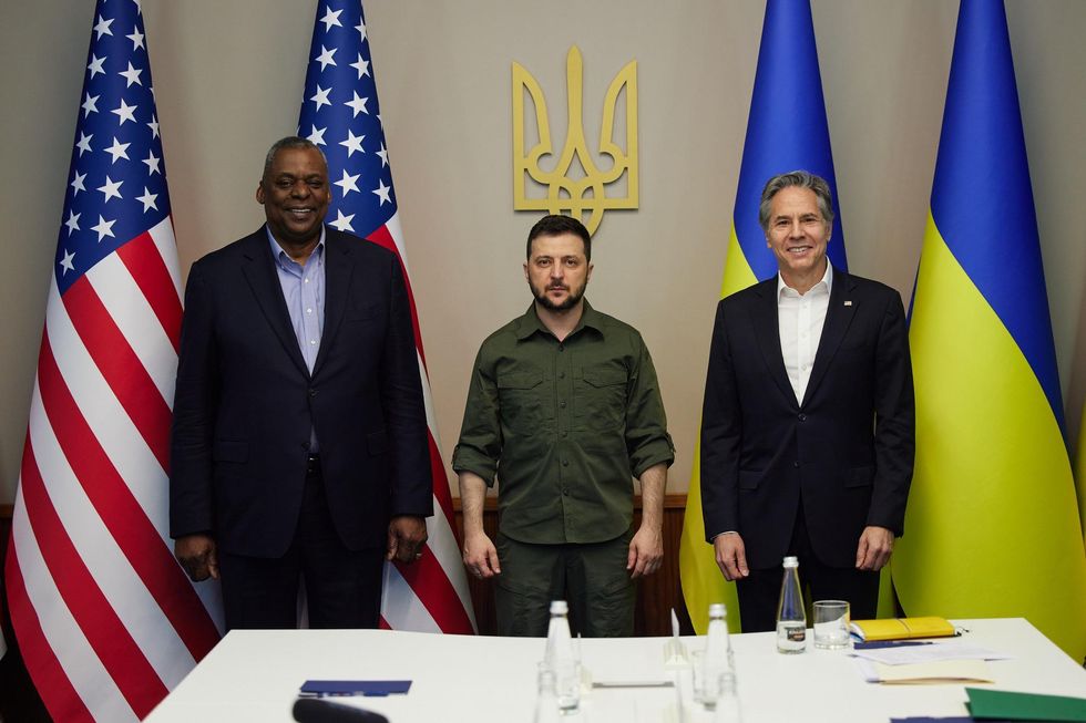 U.S. Defense Secretary Lloyd Austin (L) and Secretary of State Antony Blinken (R) meet with Ukrainian President Volodymyr Zelensky (C) in Kyiv on April 24.