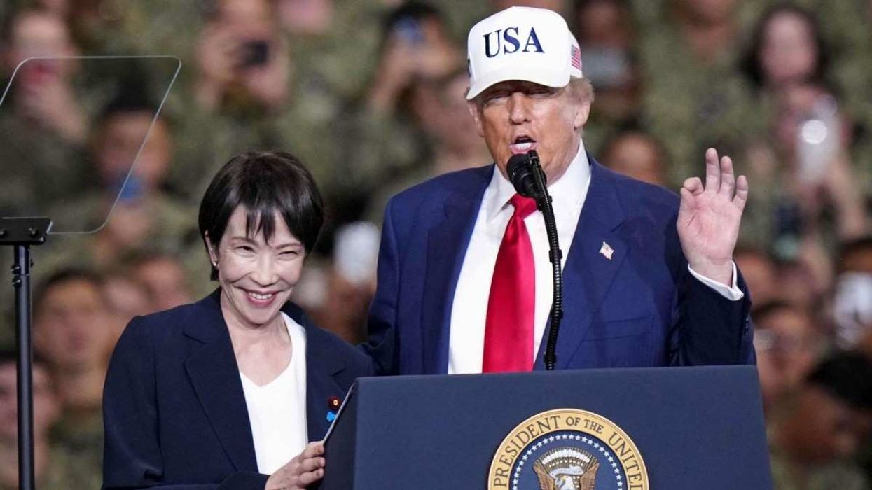 U.S. President Donald Trump, alongside Japanese Prime Minister Sanae Takaichi, speaks to the country's military personnel aboard the aircraft carrier George Washington at the U.S. Navy base in Yokosuka, Kanagawa Prefecture, eastern Japan, on Oct. 28, 2025.