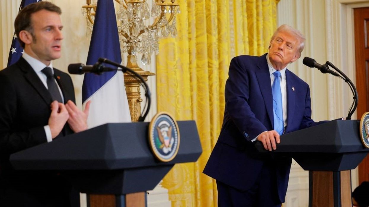 U.S. President Donald Trump and French President Emmanuel Macron attend a press conference at the White House in Washington, D.C., U.S., February 24, 2025.