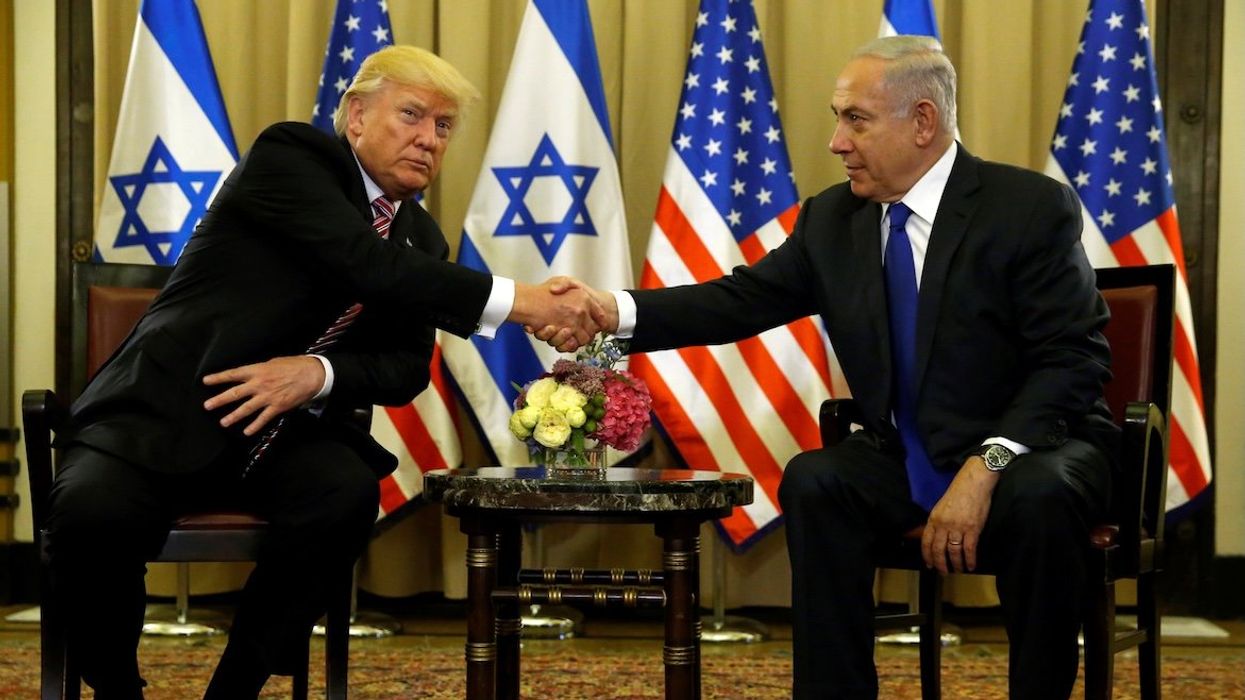 U.S. President Donald Trump and Israel's Prime Minister Benjamin Netanyahu shake hands after speaking to reporters before their meeting at the King David Hotel in Jerusalem on May 22, 2017.