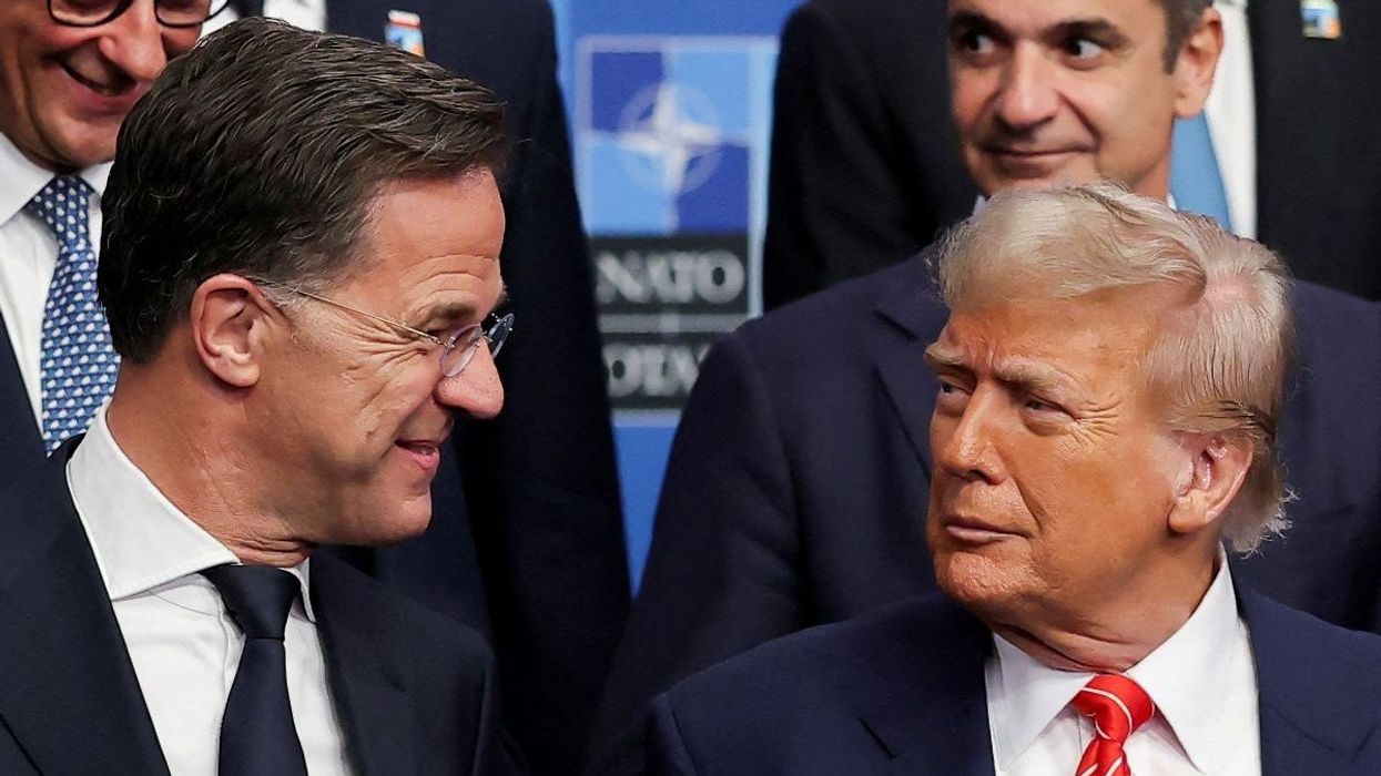 U.S. President Donald Trump, German Chancellor Friedrich Merz and NATO Secretary General Mark Rutte at a NATO leaders summit in The Hague, Netherlands June 25, 2025.