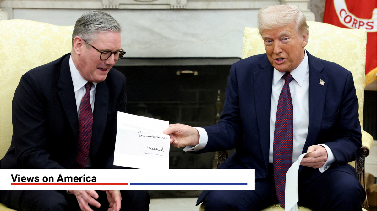 ​U.S. President Donald Trump holds a letter from Britain's King Charles as he meets with British Prime Minister Keir Starmer in the Oval Office at the White House in Washington, D.C., U.S., February 27, 2025. 