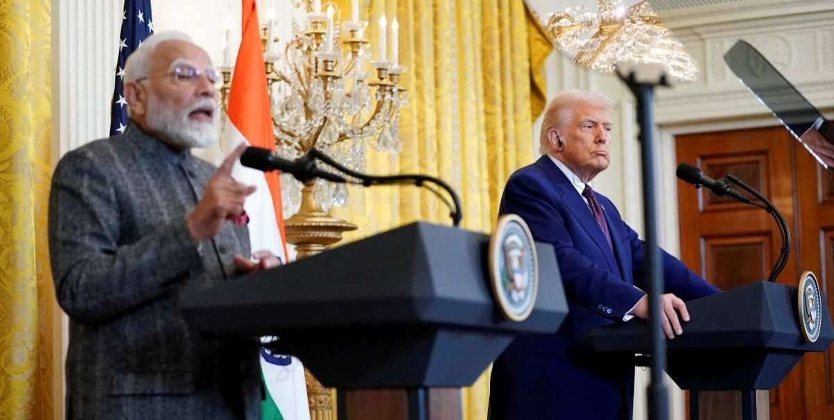 ​U.S. President Donald Trump listens as Indian Prime Minister Narendra Modi speaks during a joint press conference at the White House in Washington, D.C., U.S., February 13, 2025. 