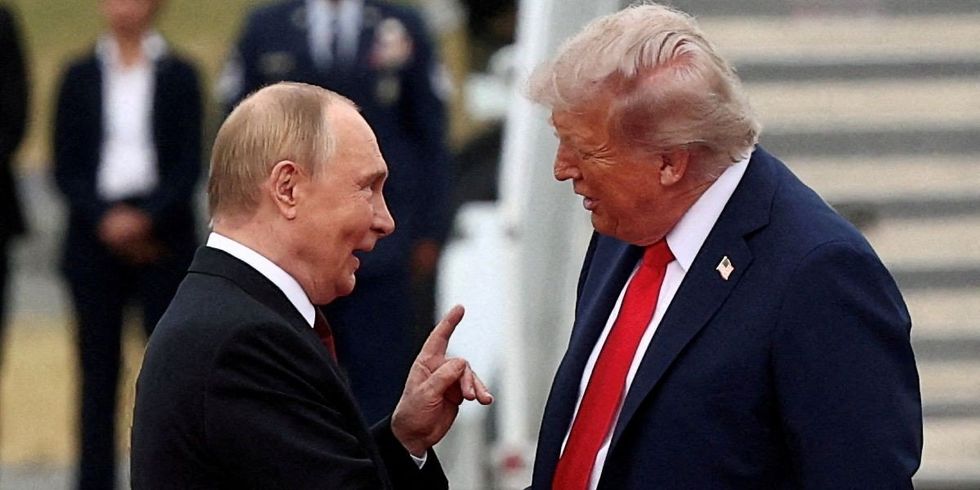 ​U.S. President Donald Trump shakes hand with Russian President Vladimir Putin, as they meet to negotiate for an end to the war in Ukraine, at Joint Base Elmendorf-Richardson in Anchorage, Alaska, U.S., August 15, 2025.