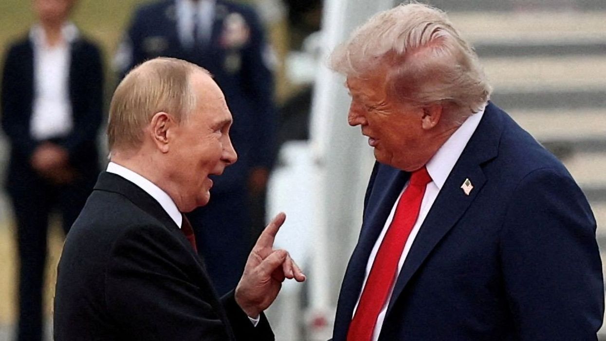 U.S. President Donald Trump shakes hand with Russian President Vladimir Putin, as they meet to negotiate for an end to the war in Ukraine, at Joint Base Elmendorf-Richardson in Anchorage, Alaska, U.S., August 15, 2025.
