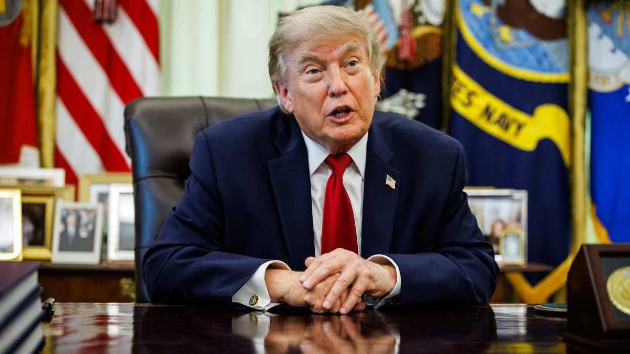U.S. President Donald Trump speaks at the Resolute Desk