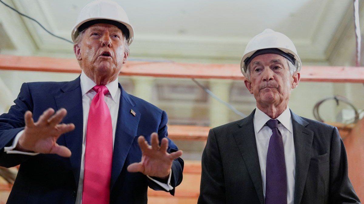 U.S. President Donald Trump speaks next to Federal Reserve Chair Jerome Powell during a tour of the Federal Reserve Board building, which is currently undergoing renovations, in Washington, D.C., U.S., July 24, 2025. 