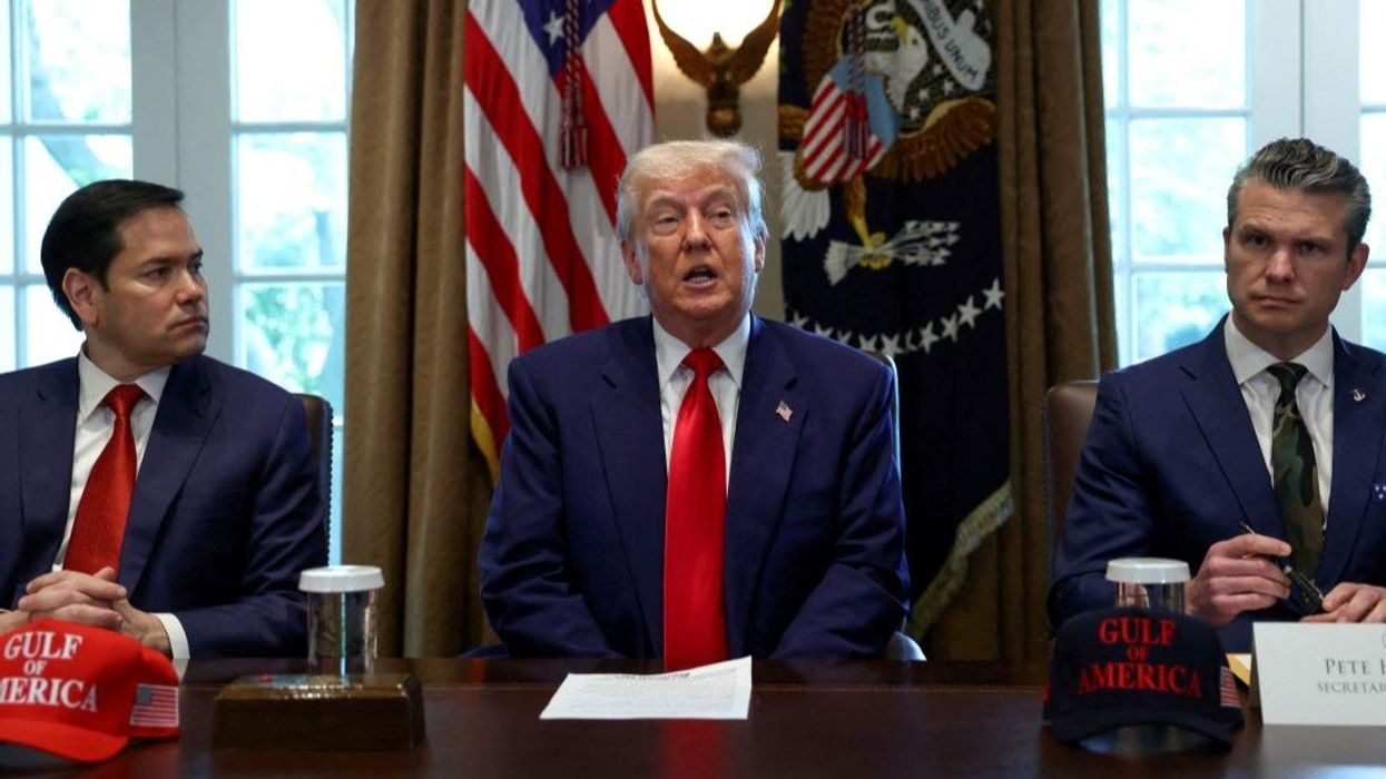 U.S. President Donald Trump speaks next to U.S. Defense Secretary Pete Hegseth and U.S. Secretary of State Marco Rubio during a cabinet meeting at the White House in Washington, D.C., U.S., April 30, 2025.