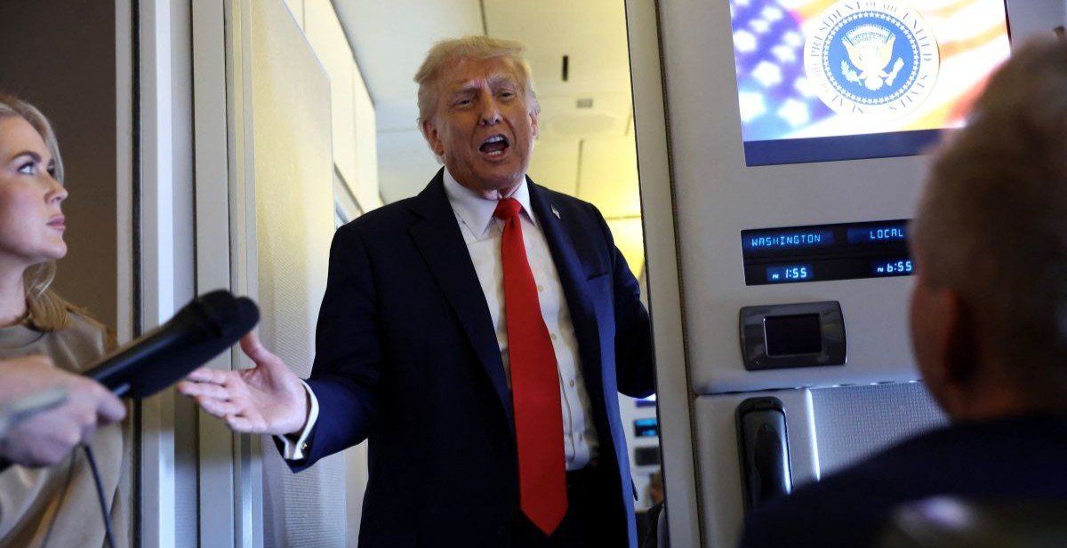 ​U.S. President Donald Trump speaks to reporters aboard Air Force One on his return from a state visit in Britain, September 18, 2025.