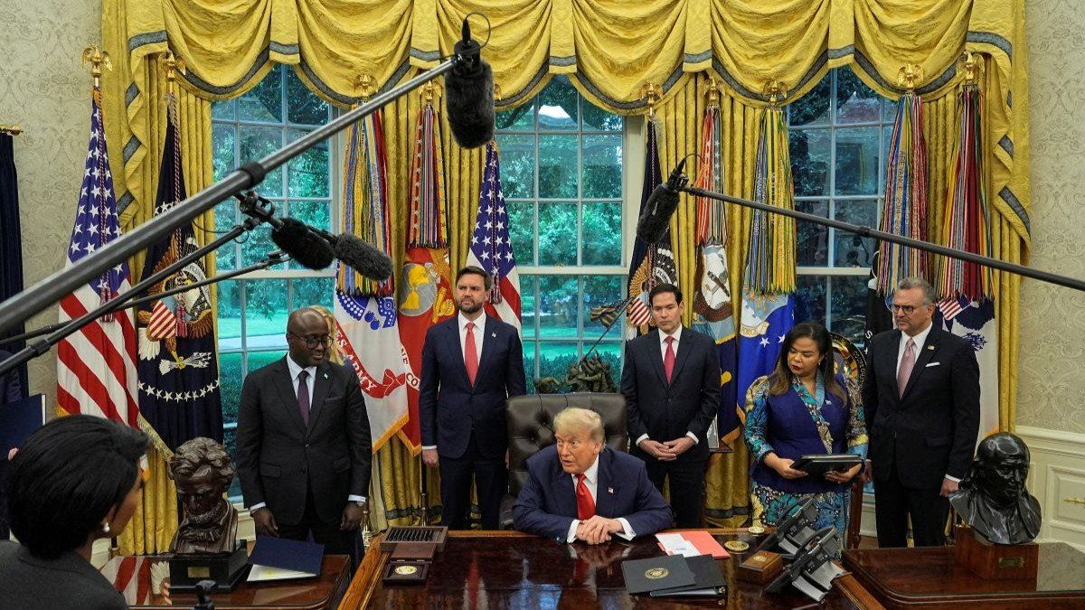 ​U.S. President Donald Trump speaks with Democratic Republic of the Congo's Foreign Minister Therese Kayikwamba Wagner and Rwanda's Foreign Minister Olivier Nduhungirehe on June 27, 2025.