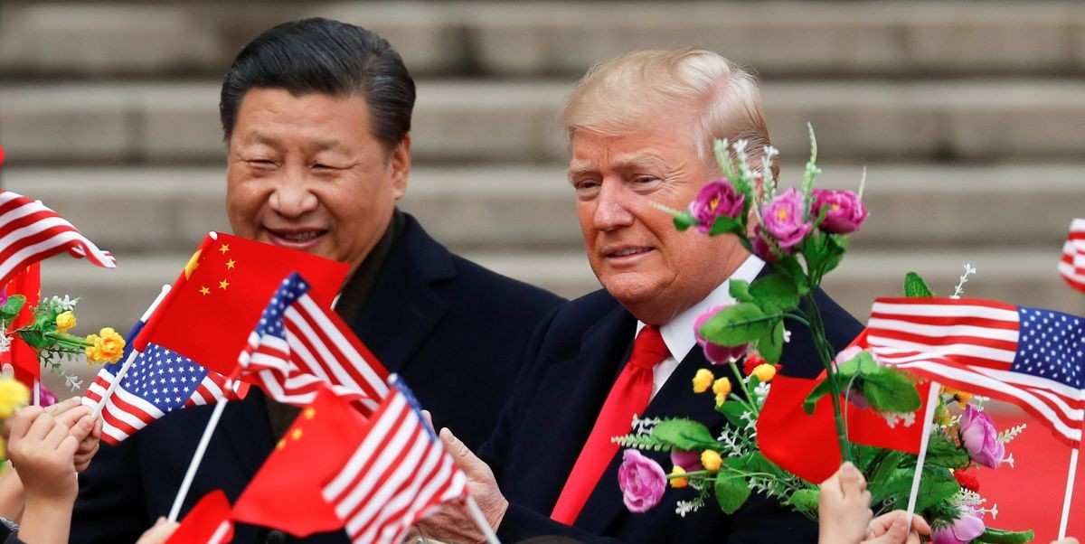 ​U.S. President Donald Trump takes part in a welcoming ceremony with China's President Xi Jinping at the Great Hall of the People in Beijing, China, November 9, 2017. 