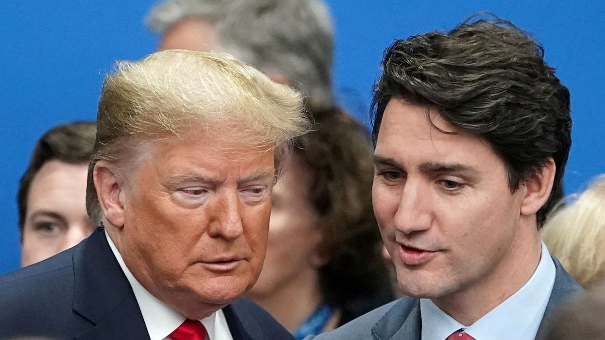 U.S. President Donald Trump talks with Canada's Prime Minister Justin Trudeau during a North Atlantic Treaty Organization Plenary Session at the NATO summit in Watford, Britain, December 4, 2019.