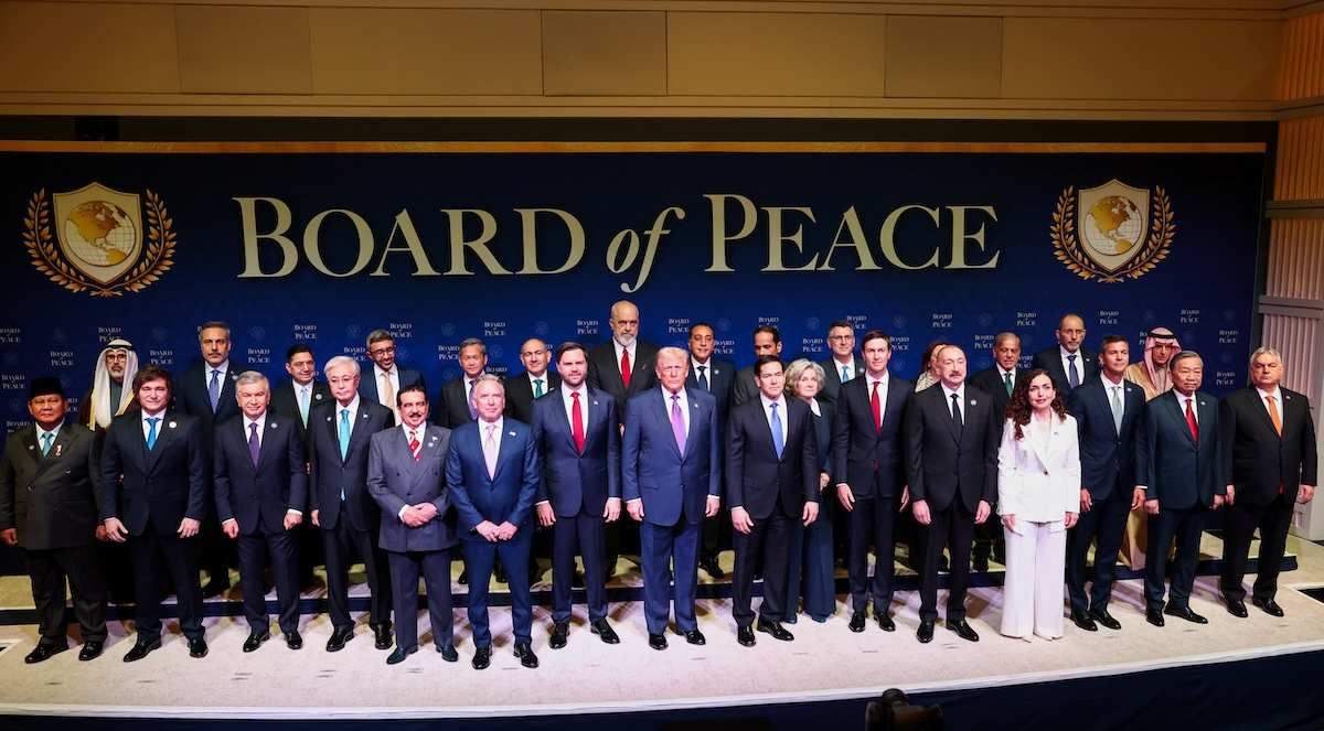 U.S President Donald Trump, U.S. Vice President JD Vance, and U.S. Secretary of State Marco Rubio pose for a family photo with other representatives participating in the inaugural Board of Peace meeting, at the U.S. Institute of Peace in Washington, D.C., U.S., February 19, 2026.