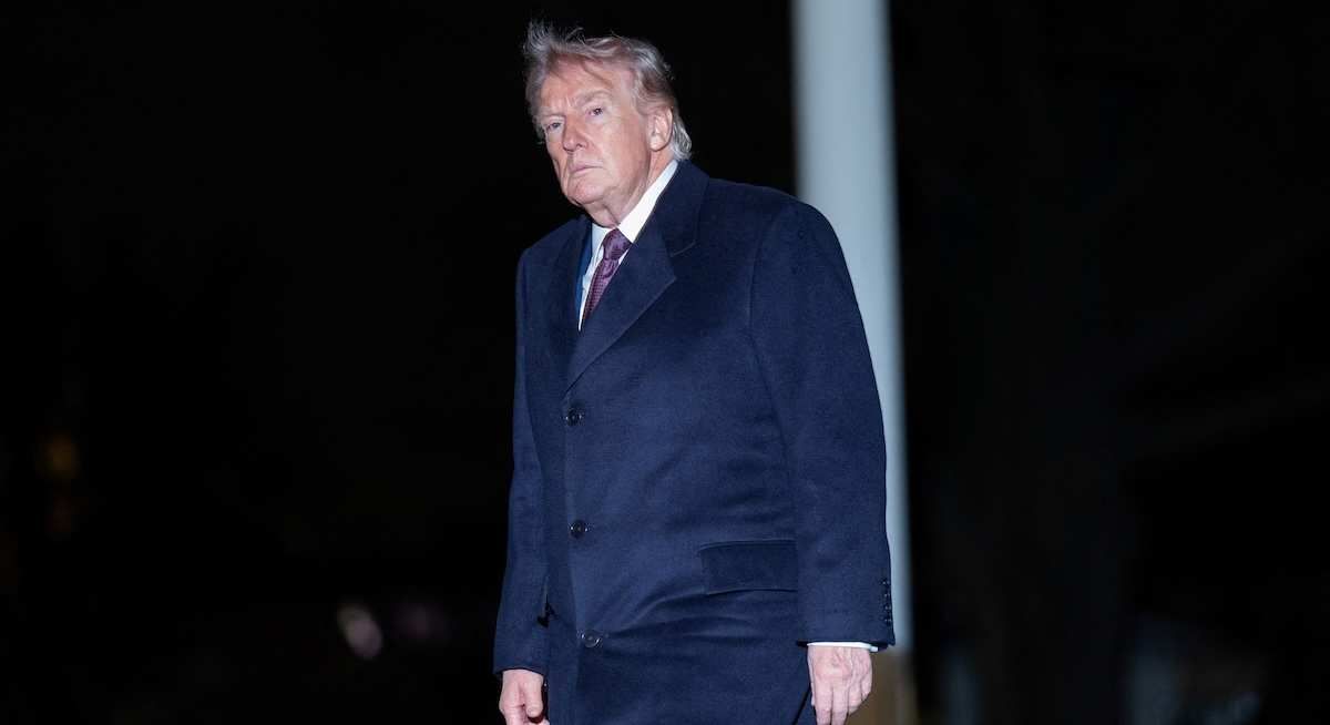​U.S. President Donald Trump walks as he arrives back at the White House in Washington, D.C., U.S., March 15, 2026. 