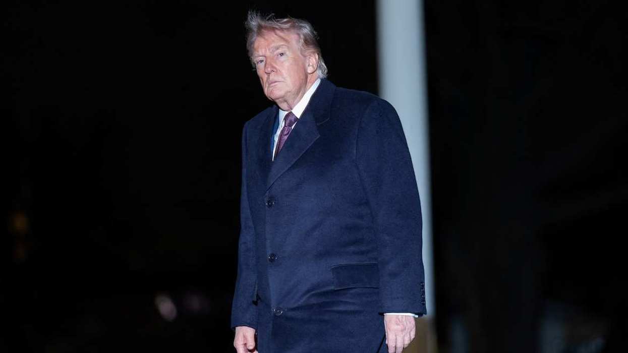 U.S. President Donald Trump walks as he arrives back at the White House in Washington, D.C., U.S., March 15, 2026.