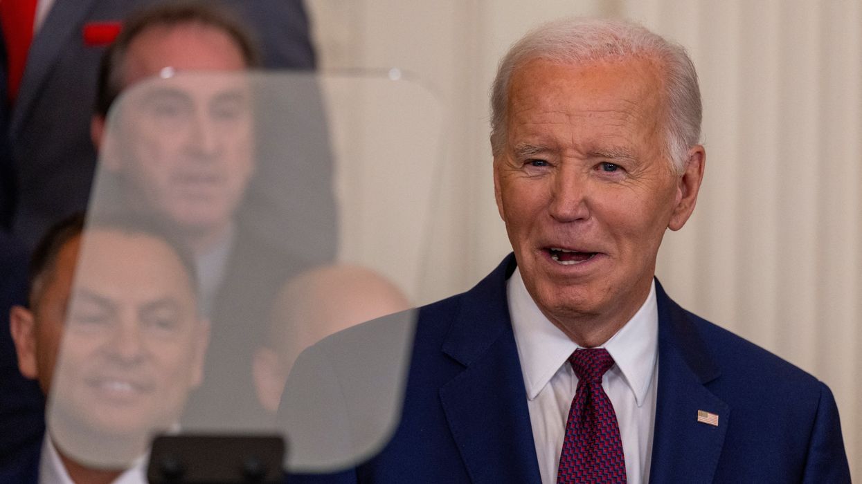 U.S. President Joe Biden addresses his guests as he welcomes the 2023 World Series champion Texas Rangers in the East Room at the White House in Washington, U.S., August 8, 2024.