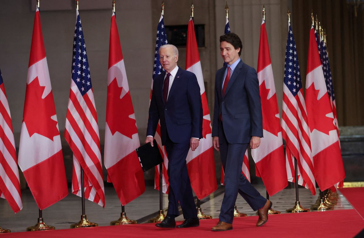  U.S. President Joe Biden and Canadian Prime Minister Justin Trudeau walk as they meet in Ottawa, Ontario, Canada March 24, 2023. 