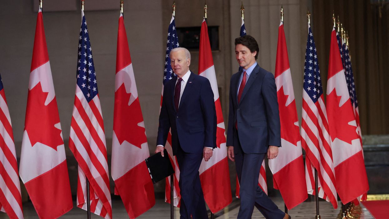 U.S. President Joe Biden and Canadian Prime Minister Justin Trudeau walk as they meet in Ottawa, Ontario, Canada March 24, 2023.