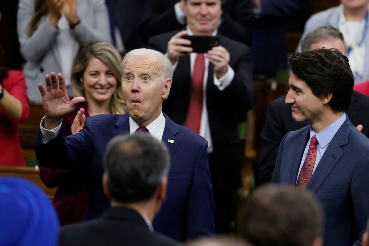 ​U.S. President Joe Biden arrives next to Canadian Prime Minister Justin Trudeau at the House of Commons of Canada, in Ottawa, Ontario, Canada, March 24, 2023. 